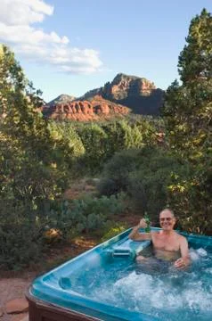 Senior man in hot tub Stock Photos