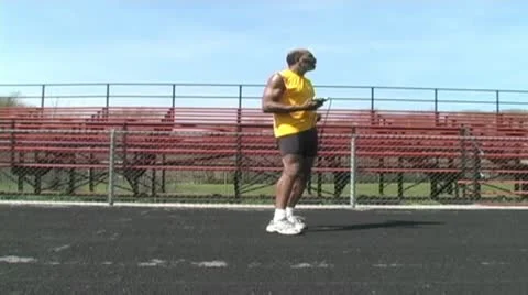 Senior man jumping rope Stock Footage 10891786