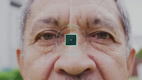 Senior man keeping eyes closed while triangle popping forming core and tech HUD Stock Footage 333445010