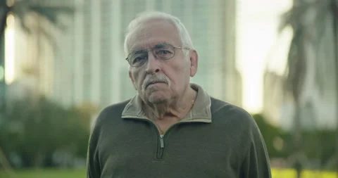 Senior man looking at camera with a serious expression Stock Footage 234531791