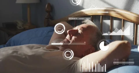 Senior man lying on bed under morning sunlight activating HUD sleep metrics 스톡 동영상 318668858