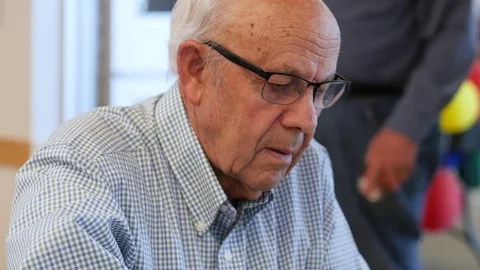 Senior Man Makes Face As He Opens A Can Of Soda Stock-Footage 76134196