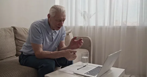 Senior man making video call to relatives Stock Footage 196238124