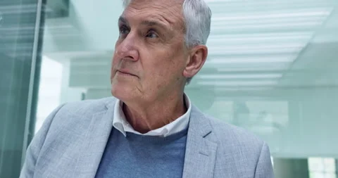 Senior man, manager and elevator in office, building or planning research Stock Footage 254835366