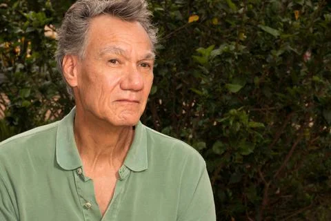 Senior man outside in deep thought Stock Photos