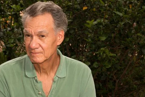 Senior man outside in deep thought Stock Photos