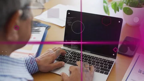 Senior man placing hands on keys, typing code for tech work as magenta overlays Stock Footage 334743736