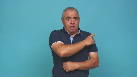 Senior man pointing to the side Stock Footage 144217527