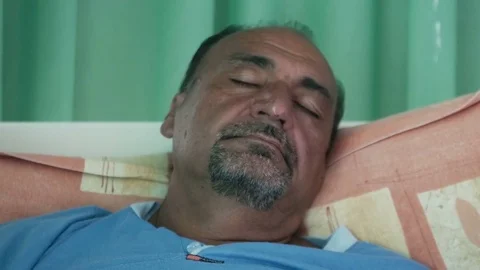 Senior man portrait on the sofa Stock Footage 76037826