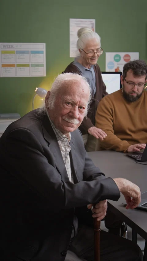 Senior Man Posing in Computer Class Vertical Stock Footage 333709372