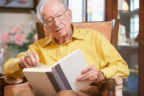 Senior man reading book Stock Photos