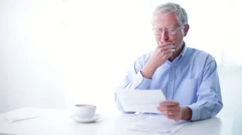 Senior Man Reads Mail Stock Footage