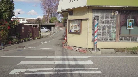 Senior man riding bicycle on road Stock Footage