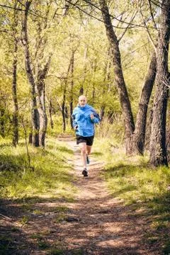 Senior Man Running in the Forest 스톡 사진