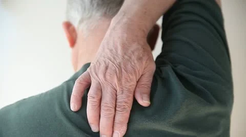 Senior man scratching his back Stock Footage 12082908