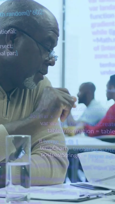 Senior man seeing code, leaning and reviewing notes while overlaying pages and Stock Footage 330260089