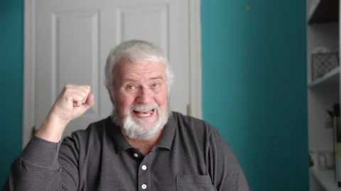 Senior Man Shows Different Expressions in Front of a Simple Background Duri.. Video stock 337642802