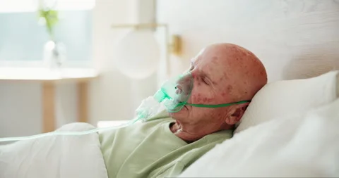 Senior man, sick and oxygen mask in bed with healthcare for wellness Stock Footage 280806980