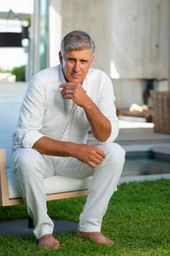 Senior man sitting Stock Photos