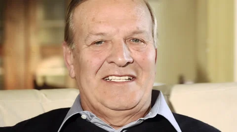 Senior man smiling and winking Stock Footage 28135418