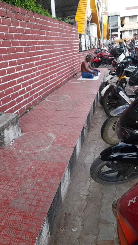 Senior Man Smoking While Sitting On roadside  Footpath Stock Footage 235715908