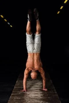 Senior man stand upside down 스톡 사진
