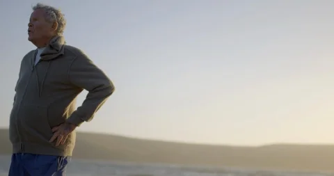 A senior man standing on the beach. Stock-Footage 88404435