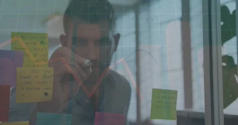 Senior man stepping into view studying sticky notes tracing business graph Stock Footage 318476874