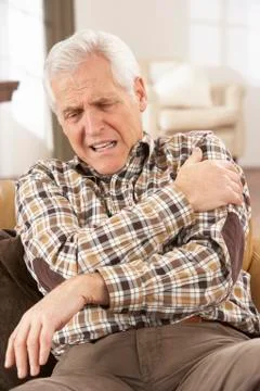 Senior Man Suffering Cardiac Arrest At Home Stock Photos