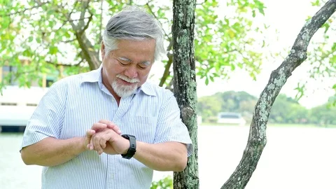 Senior man talking to his smart watch. Stock Footage 92296099
