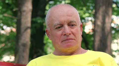 Senior man thinking about something outdoors Video stock 52993127