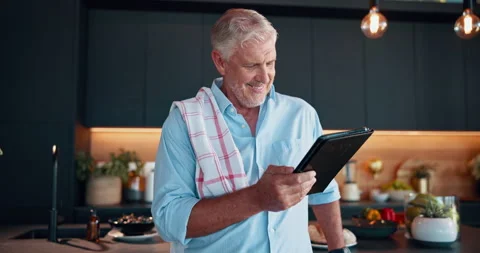 Senior man, thinking and tablet for cooking, food website and online tutorial 動画素材 301315573