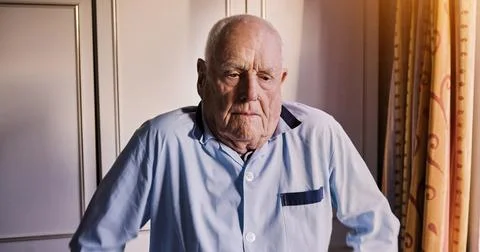 Senior man, thinking or sad in bedroom with anxiety, grief or frustrated alone Stock Photos