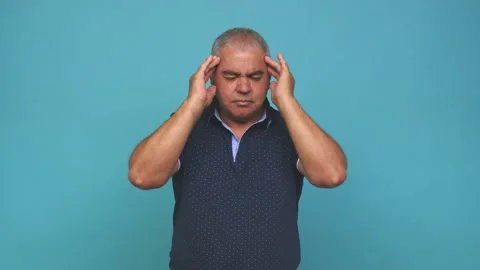 Senior man touching temples and having headache Stock Footage 144217836