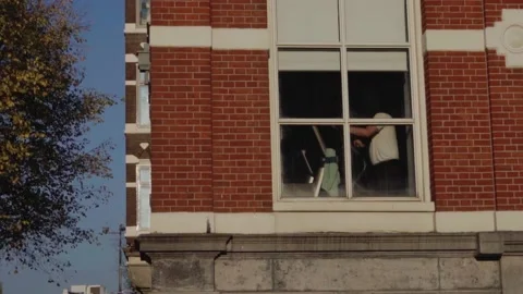 Senior man training behind a window. Stock Footage 225546257