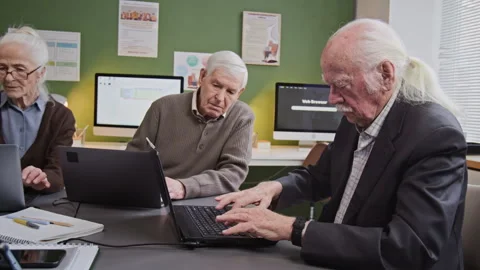 Senior Man Typing on Keyboard in Computer Literacy Class Stock Footage 333704116
