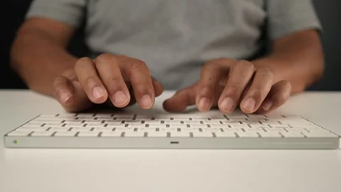 Senior man typing work at the computer keyboard Stock Footage 250147266
