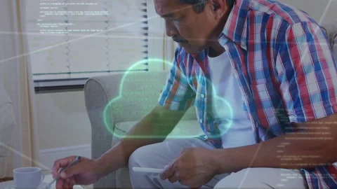 Senior man using calculator while doing finances, syncing phone as cloud overlay Stock Footage 334338100