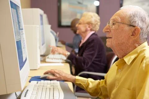 Senior man using computer Stock Photos