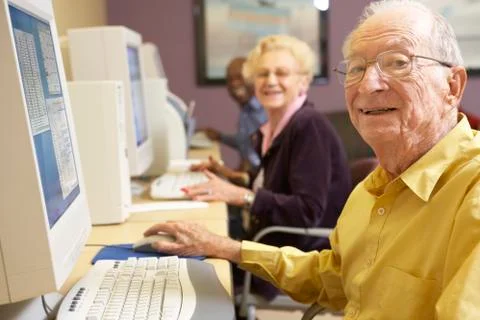 Senior man using computer Stock Photos