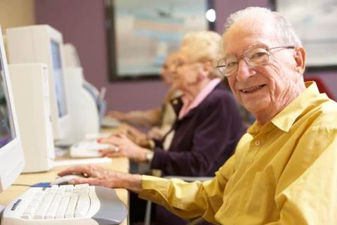 Senior man using computer Stock Photos
