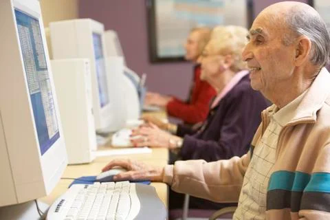 Senior man using computer Stock Photos