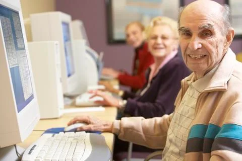 Senior man using computer Stock Photos