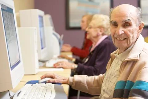 Senior man using computer Stock Photos