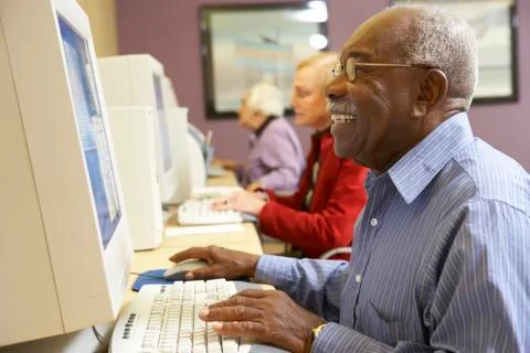 Senior man using computer Stock Photos