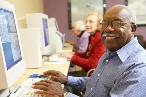Senior man using computer Stock Photos