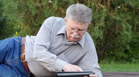 Senior Man Using Digital Tablet Stock Footage 55913266