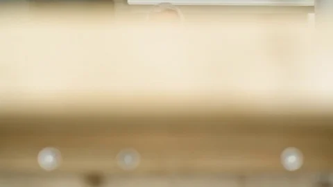 Senior man using a laptop in a dining room Stock-Footage 83394605