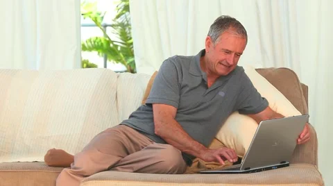 Senior man using a laptop Video stock 1899120