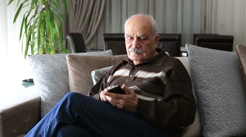 Senior Man using smartphone Video stock 46382807